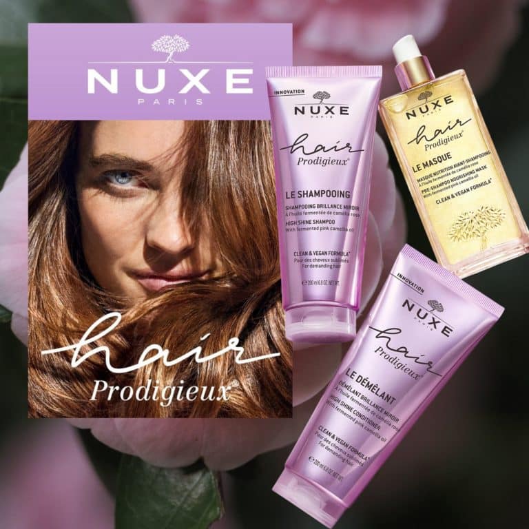 Nuxe Hair Prodigieux collection featuring high shine shampoo, conditioner, and nourishing mask with fermented pink camellia oil, shown with model and flower background.
